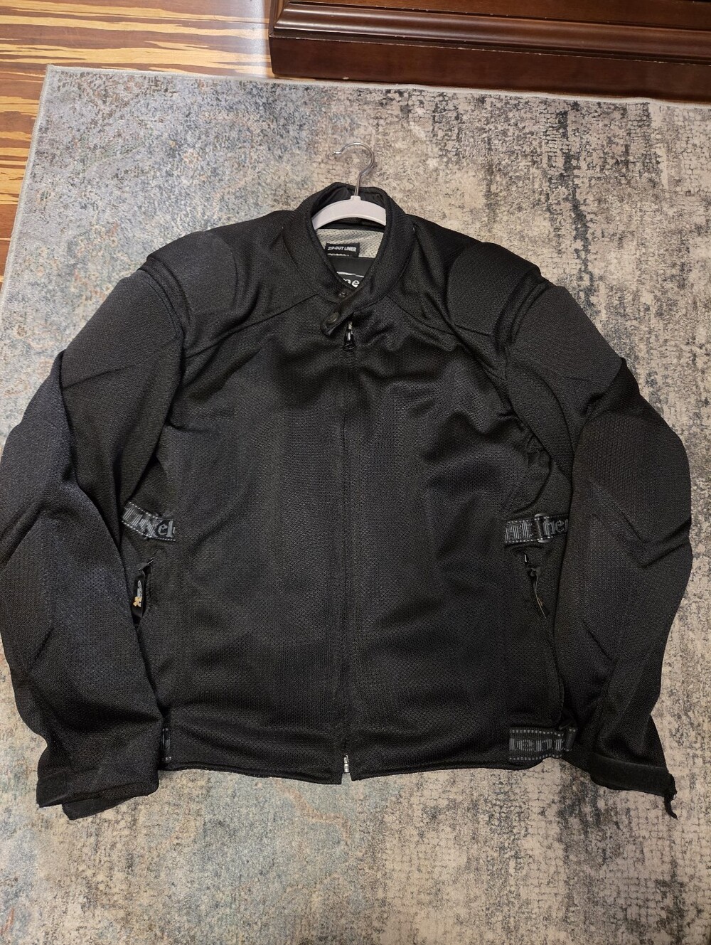 Never worn! NWOT Xelement Armored Mesh Riding Jacket. Includes zip-out liner L